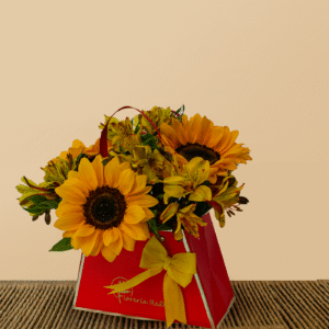 Caja Roja con Girasoles y Flores Amarillas – Arreglo Radiante para el Día de la Madre